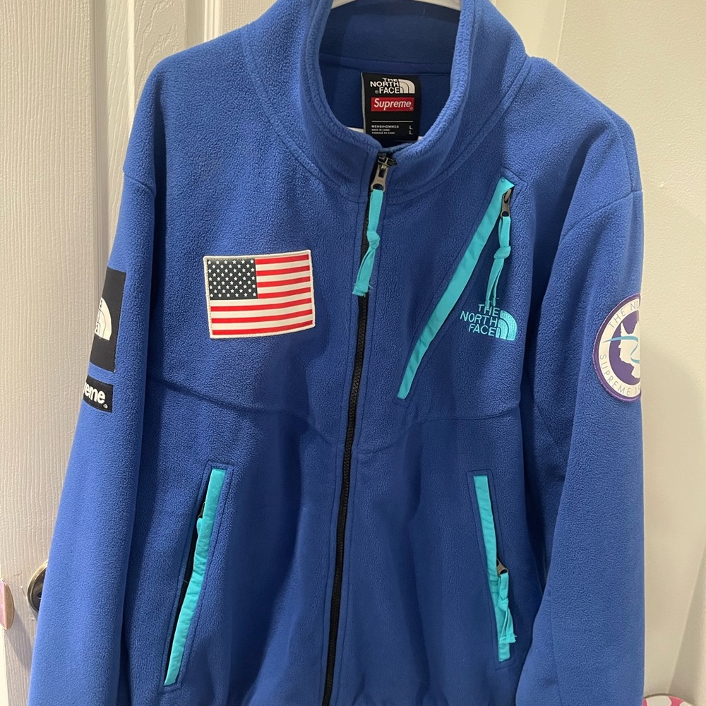 The North Face/ Supreme Trans Antarctica
Expedition Blue Zip Up Sweater